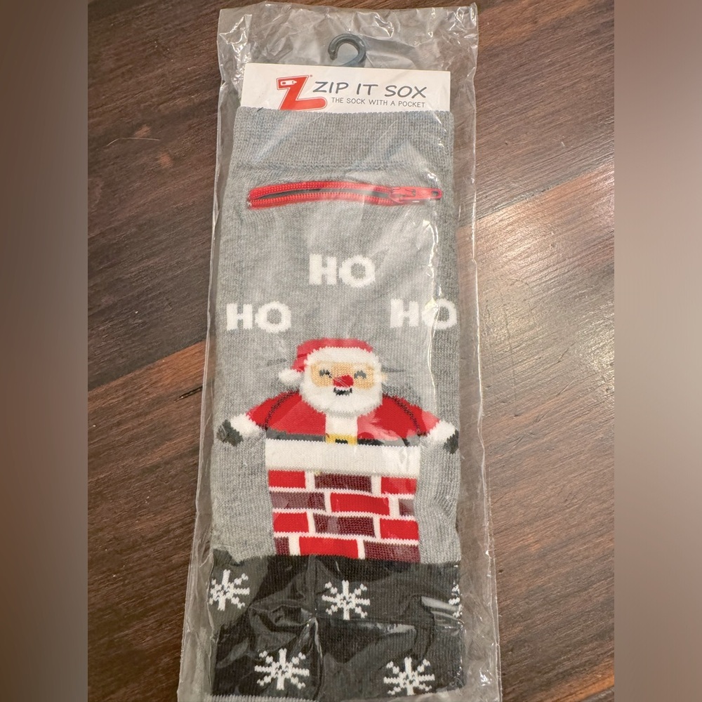 Zip It Sox Santa socks. One size fits all. Christmas socks